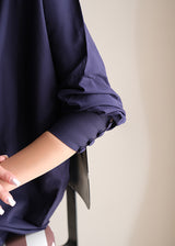 Sapphire blue crepe suit with a V-cut neckline and wide-leg pants