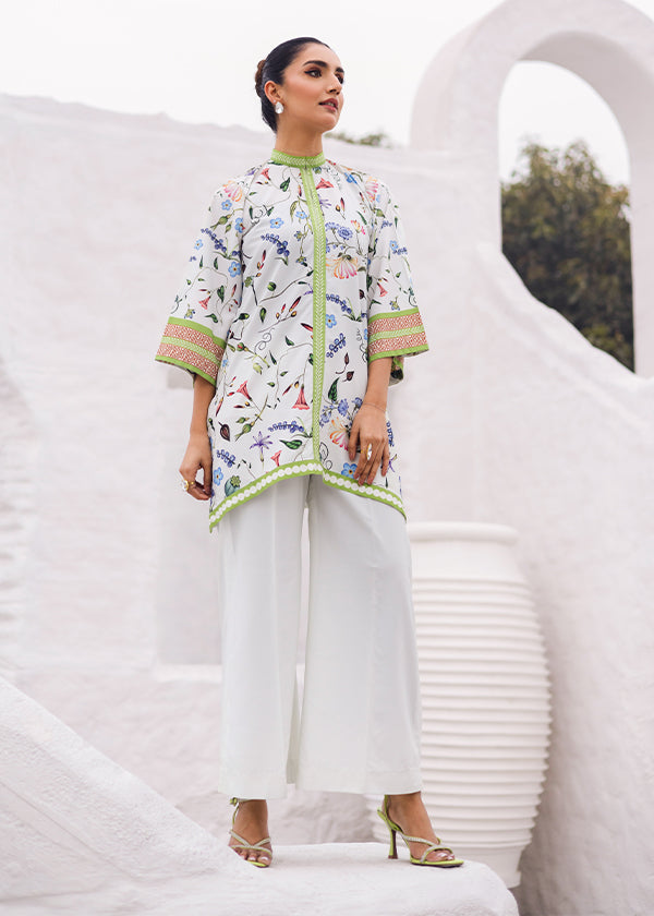 Whimsy Soft Mint Polka Dot & Floral Dress with Intricate Details by Zainab Musa.