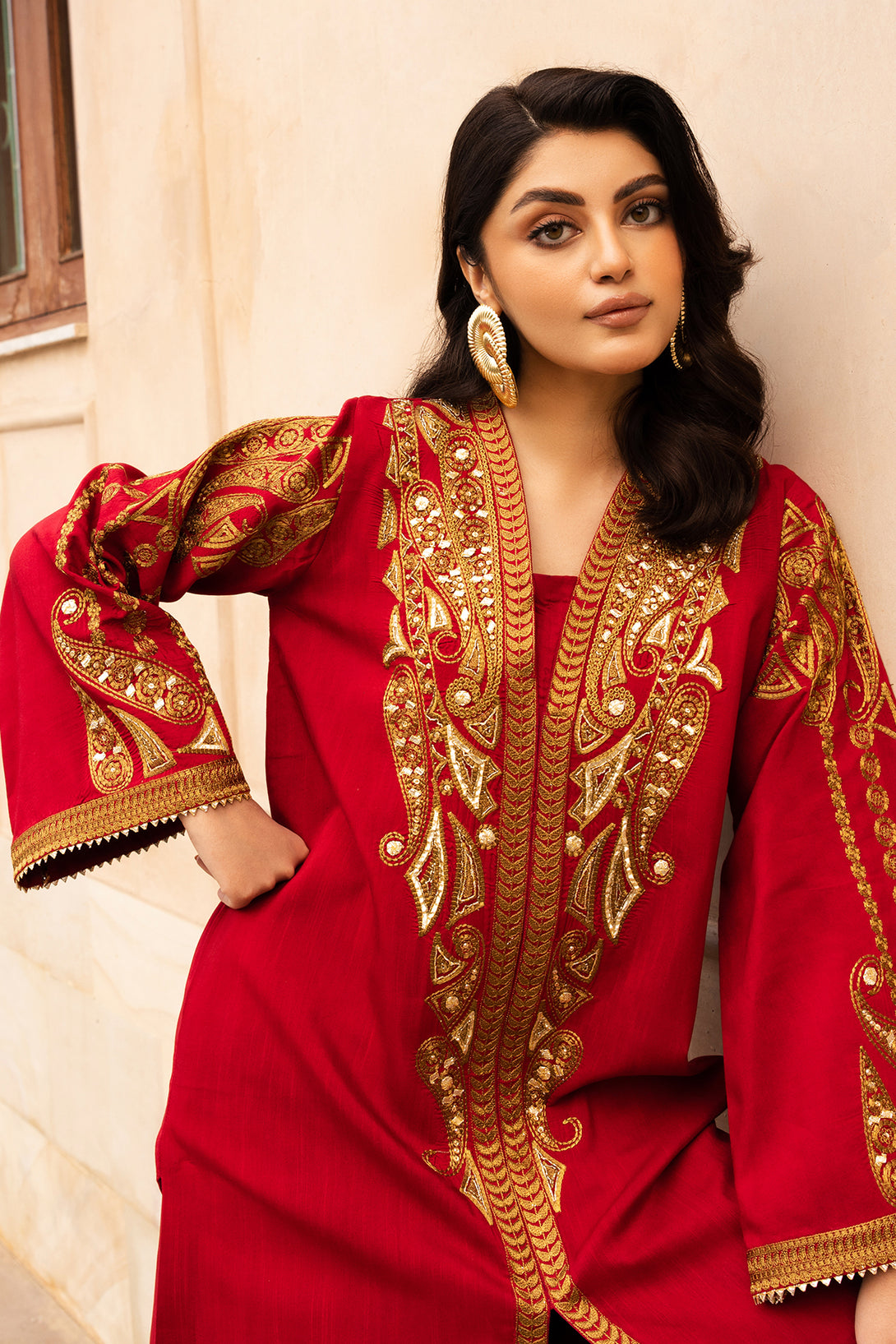 Aabroo embroidered raw silk party wear dress with organza dupatta.

