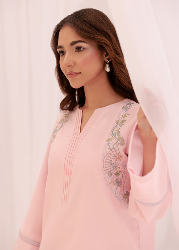 Buy Peony blush pink embroidered outfit online – a chic ensemble with delicate embroidery, a breathable lawn shirt, and elegant tapered pants.